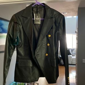 Woman’s leather double breasted blazer jacket.